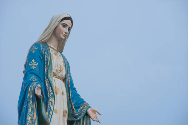 istock virgin mary statue with blue background 639019004