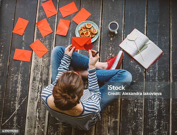 Young Woman Writing A Valentine Card Top View Stock Photo - Download Image Now - Letter - Document, Valentine's Day - Holiday, Love Letter