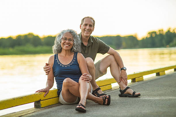 istock Older mature couple posing for the camera and smiling 639020108