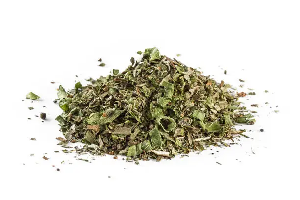 Photo of mixed Italian herb seasoning on a white background