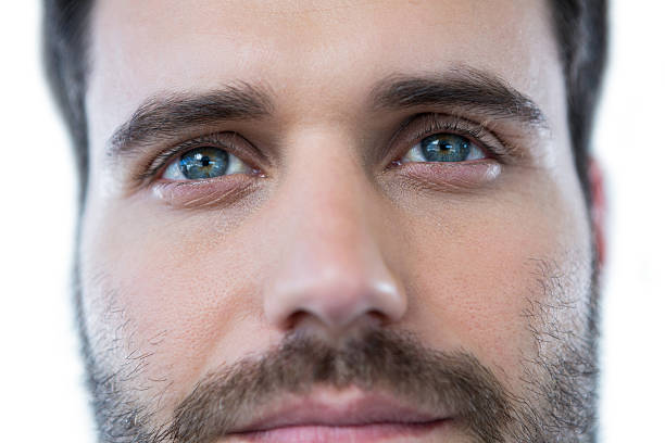 istock Man with green eyes 639025060
