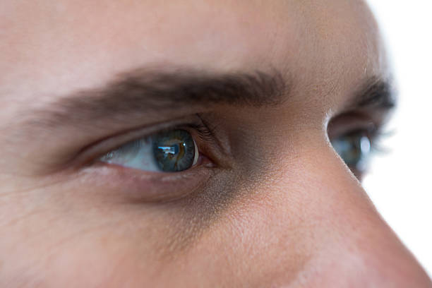 istock Man with green eyes 639025070