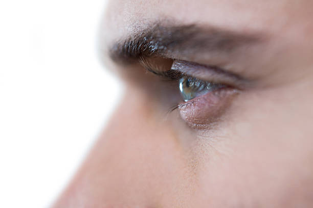 istock Man with green eyes 639025092
