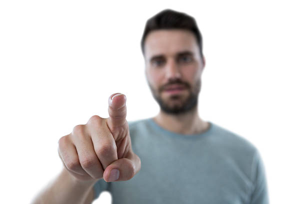 istock Man pretending to touch an invisible screen 639025366