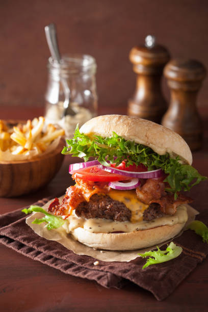 istock bacon cheese burger with beef patty tomato onion 639026062
