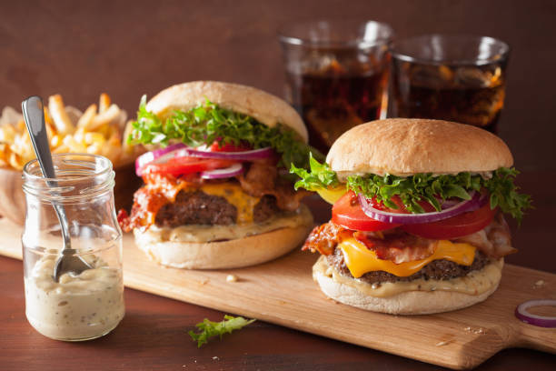 istock bacon cheese burger with beef patty tomato onion 639026784