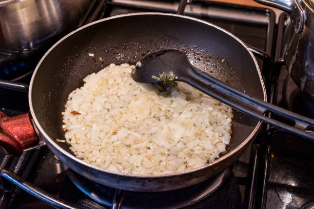 istock Onion frying in pan 639033026
