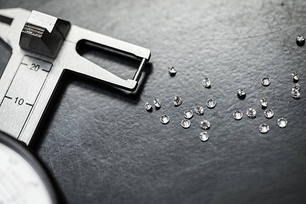 Professional gemstone settings jewellery craft laboratory: Selecting diamonds
