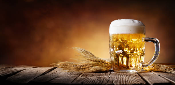 istock Beer With Wheat On Wooden Table 639034922