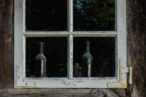 istock The old bottles in a farmhouse window 639035700
