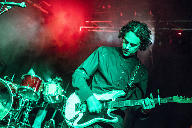 istock Musician play guitar on the stage in a live performance 639037082