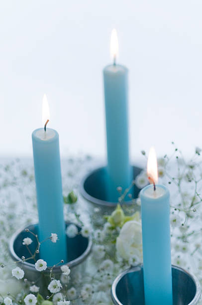 istock Candle with white flower 639037684