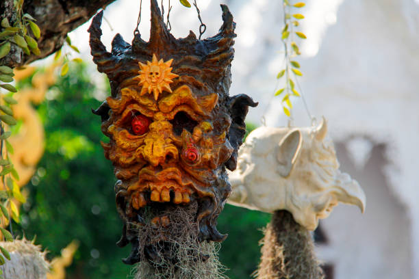 istock Terrifying Skull Flowerpot with Roots germinate from the Mouth 639037918