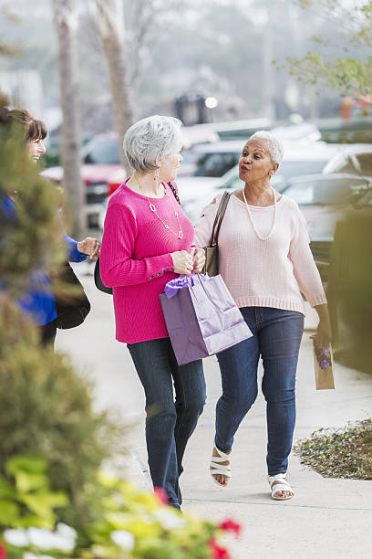istock Three multi-ethnic senior women out shopping 639037956