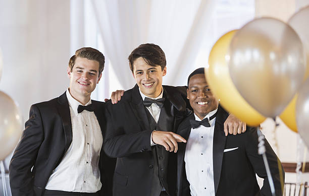 istock Three young men wearing tuxedos 639039450