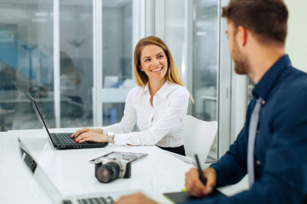 istock Young business people working together on project 639040010