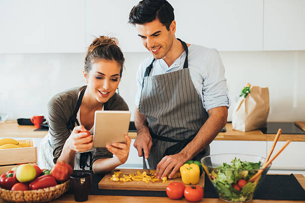 istock Young couple cooking in the kitchen 639041148