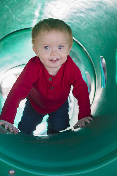 istock 2 year old at the local park 639041820