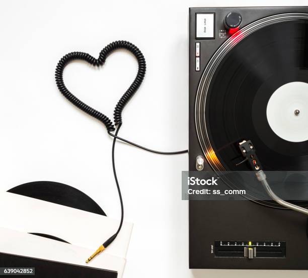 Romantic Music Concept Turntable Vinyl And Cord Shaped Of Heart Stock Photo - Download Image Now