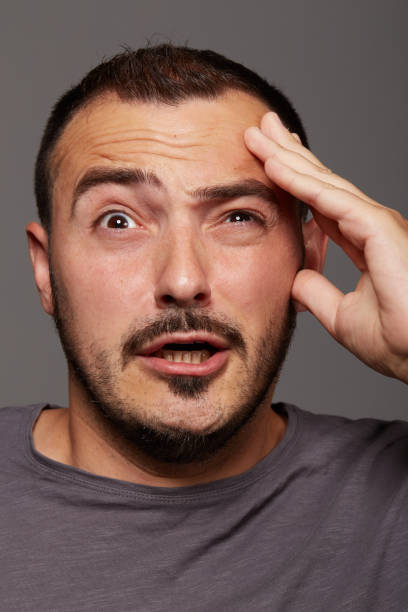 istock Portrait of thinking man 639043330
