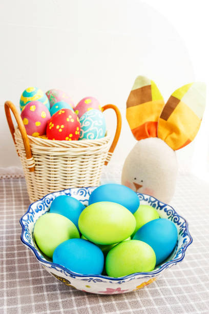 istock Colorful easter eggs in the basket. Easter bunny 639044098