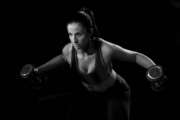 istock fitness girl with weights 639044758