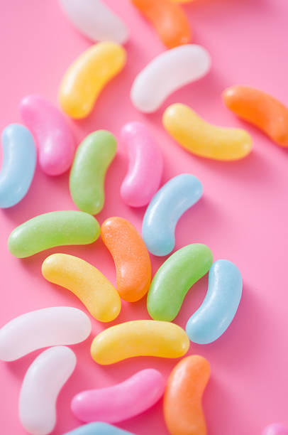 istock Colourful jelly beans on pink background 639052234