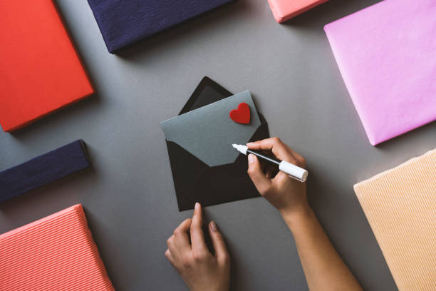 istock Valentine's day presents and hand writing greeting card 639052404