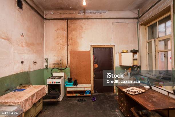 Dirty Kitchen Is In The Temporary Apartment For Living Refugees Stock Photo - Download Image Now