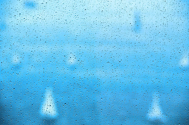 istock Rain on window in Dubai, sailboats visible 639054222