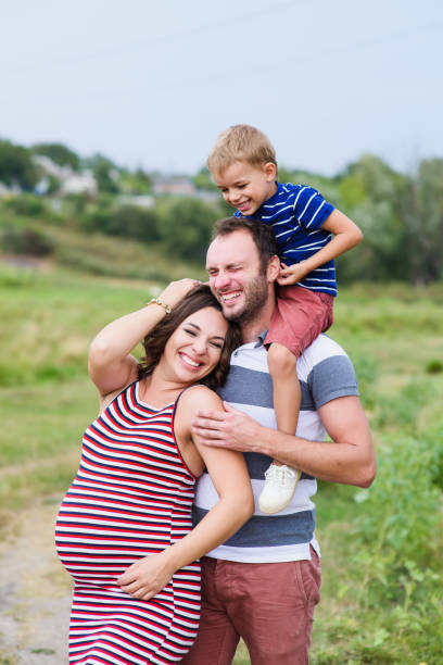 istock Mother, father and their son 639054576