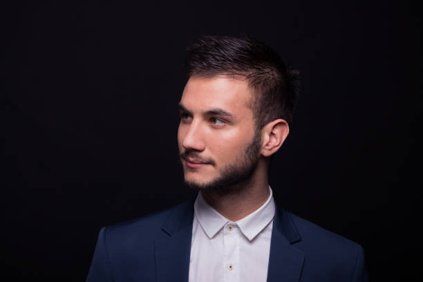 istock young man head shoulders face looking sideways 639054650