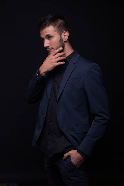 istock young man sexy looking hand beard 639055520