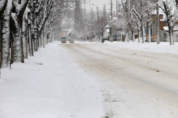 istock Slippery urban road after snowfall 639055568