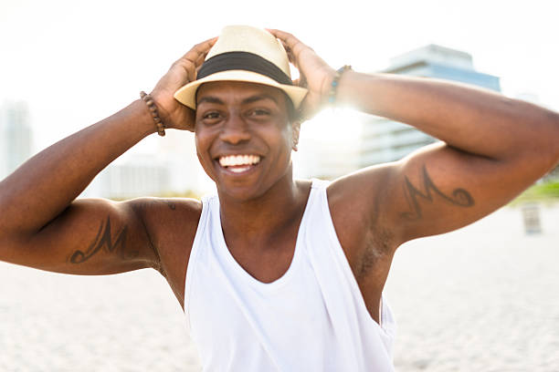 istock African man dancing on Miami beach 639058582