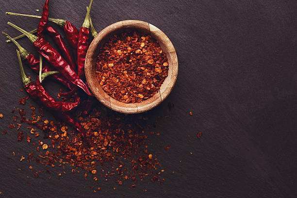 rojo chili peppers  - guindilla fotografías e imágenes de stock