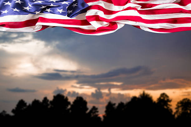 istock Background:  American flag with sunset background. 639063316