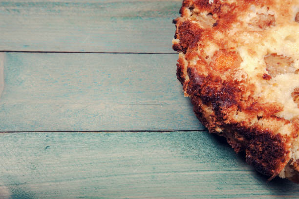 istock Apricot cake on wooden background 639065624