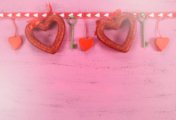 istock Happy Valentines Day background with hanging hearts 639069460