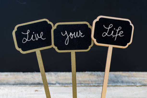 istock Motivational message Live Your Life written with chalk 639069840