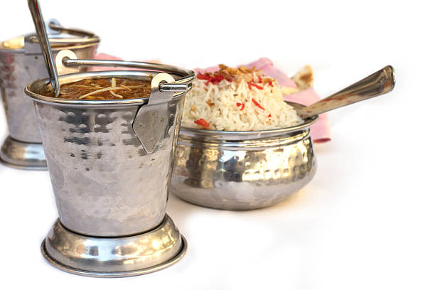 istock Indian food in traditional dishware on white background 639069886