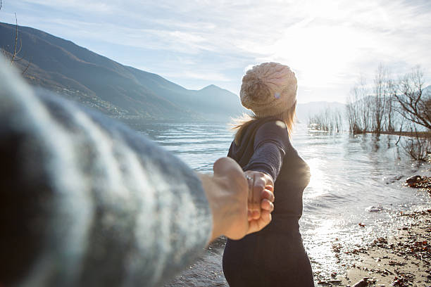 istock Follow me concept-Blond girlfriend leading man holding hand 639070368