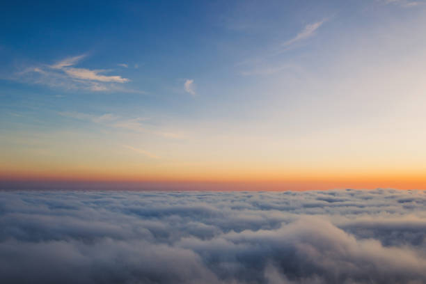 istock Beautiful sunset on the hill above clouds 639070714