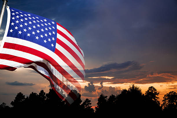 istock Background:  American flag with sunset background. 639072288