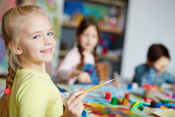 istock Youngster with paintbrush 639079144