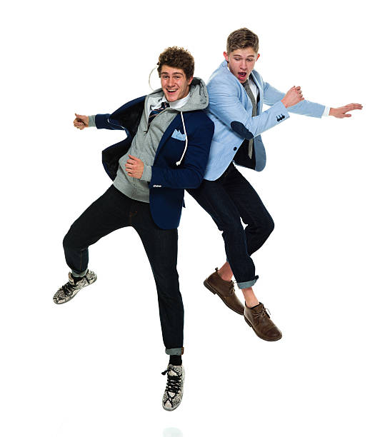 istock Brothers jumping and having fun together 639082602