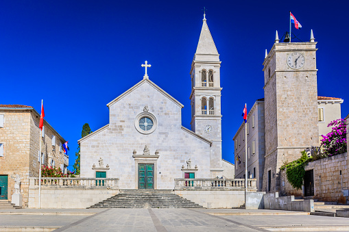 Historic old stone architecture of cathedral in Supetar, Island Brac, Croatia, european landmarks. 