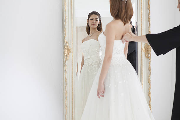 istock The bride is reflected in the mirror. 639085684
