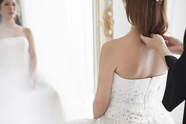 istock The bride is reflected in the mirror. 639085832
