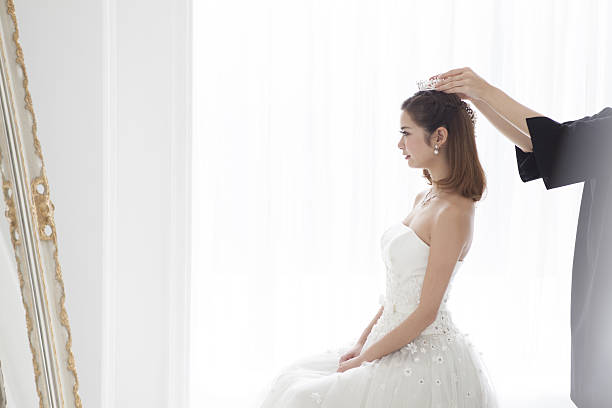 istock The bride is busy preparing. 639085972